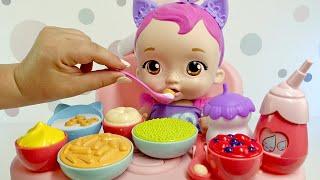 Comida interactiva para muñecas  My Garden Baby y la trona de Baby Annabell