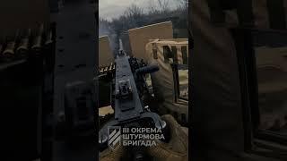 Ukrainians opens fire on Russians using a .50 calibre machine-gun on an American MRAP vehicle