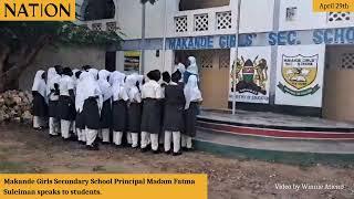 Makande Girls Secondary Principal Madam Fatma Suleiman speaks to students on school's postponement.