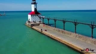 Busy Spring Day At The Michigan City, Indiana Lighthouse & Pier 4K Drone footage March 21 2021