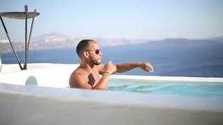 INFINITY POOL IN OIA SANTORINI GREECE