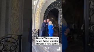 Donald Trump greets Israeli Prime Minister Benjamin Netanyahu