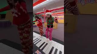 Happy Holidays! Giant floor piano with Notasium Band kids!