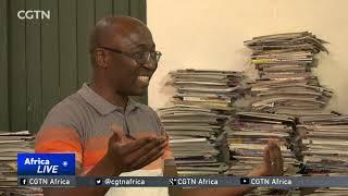 Mozambican-born artist uses recycled magazines on glossy works