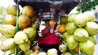 Cutting Coconuts As Fast As A Machine By An Old Man Sell On The Street In Phnom Penh City