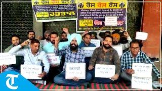 Cooperative bank employees protest over 6th pay commission outside RCS office in Chandigarh