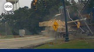 Train slams into 18-wheeler carrying military vehicle in South Carolina