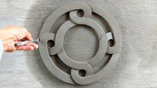 The idea of ​​using a circular compass - Decorate the wall with a cement circle pattern