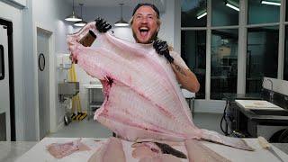 Filleting Halibut in a Fish Market