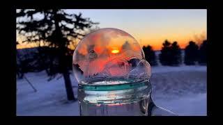 Soap Bubble Freezes in Minnesota Winter Creating Mesmerising 'Snow Globe'