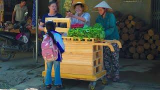 The Single Old Man used a wheelbarrow for the first time to sell vegetables AND peanuts.