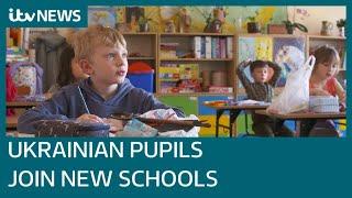 Ukrainian children try to forget about war as they settle into new schools in Poland | ITV News