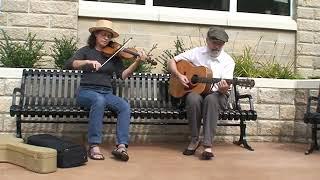 John and Chris from Kennedy's Kitchen perform on Floyd's Bench, Muskegon, MI