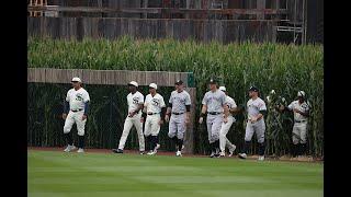 Kevin Costner leads the Yankees and White Sox out of the cornfield at MLB at Field of Dreams!