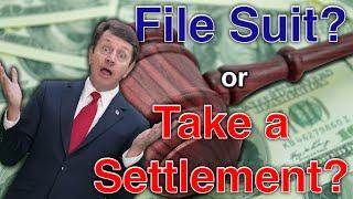 Should You File A Suit Or Take A Settlement?  Board Certified Trial Lawyer explains your rights.