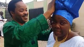 Prof. Doyin Hassan shows off his Gele Tying skill