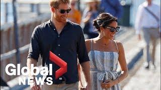 Meghan Markle cradles stomach as she rejoins Prince Harry on Fraser Island