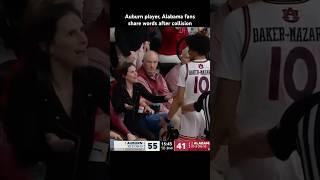 Auburn’s Chad Baker-Mazara shares words with Alabama fans after falling into the crowd #auburntigers