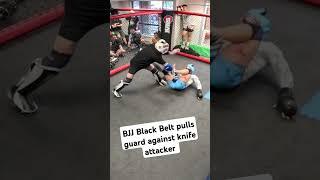 BJJ Black Belt pulls guard against knife attacker