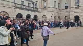 Tourist keep stepping out over the white line to get a picture police shout to get back #horseguard