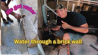 How to install a spigot through a cinder block wall