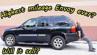 Flipping a very high mileage, very cheap, very rusty GMC Envoy for a profit.