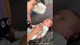 Omar Rudberg singing to a baby