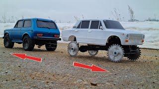 4x4 VAZ 2101 on saws against Niva 4x4 ... Tug! + RC truck Volvo and Axial Capra