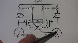 Astable multivibrator demo circuit w NPN 2n2222  and capacitors explained by electronzap