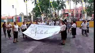 procesión barrio Independencia llegando ala Parroquia de San Juan Bautista 