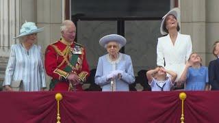 Royals watch flypast from Buckingham Palace