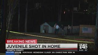 Juvenile shot at Coweta County home