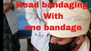 Head bandaging with one bandage by PC nursing procedure