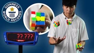 Fastest Juggle and Solve of Three Cubes EVER! - Guinness World Records