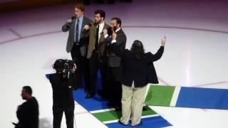 O Canada: Mark Donnelly and sons sing before Canucks vs Ducks at Rogers Arena, Vancouver BC