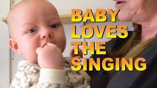 Linden calms down with  a Karen Carpenter song by Annie    He is 4 months old.