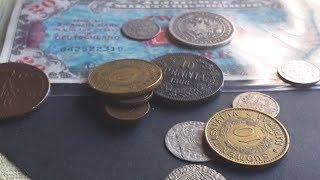 Unboxing new coins and banknotes