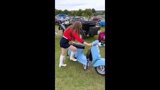 Cute Mod girl starts & rides her Vespa 90 up Kop Hill Climb