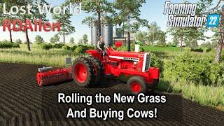 Rolling the New Grass and Buying Cows | E20 Lost World | Farming Simulator 22