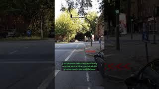 Bike lane next to car lane in Hamburg, Germany