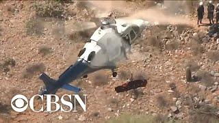 Helicopter rescue of injured woman spins out of control in Phoenix