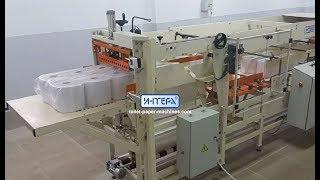 Automatic packing machine for rolls of toilet paper and towel