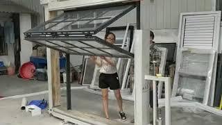 Windows and doors China. Vertical folding window Export to Thailand. Window and door also in uPVC