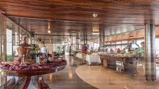 Panorama showing morning catering buffet food indoor in luxury restaurant with meat, colorful fruits