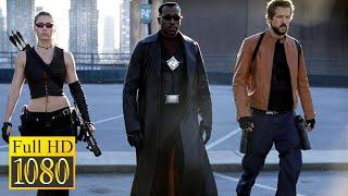 Ryan Reynolds and Jessica Biel rescue Wesley Snipes from vampires and the police / Blade: Trinity