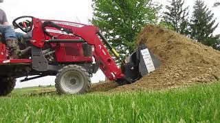 Massey Ferguson GC1725M Sub Compact Tractor Moving Gravel with Bucket