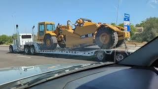 Highway Haulers -- Stearns Inc. Peterbilt 379 Hauling A CAT 613C Elevating Scraper -- May 12, 2023