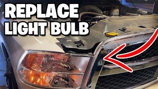 How to change Ram 1500  Headlight Bulb