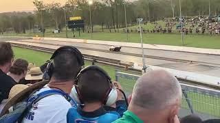 A race car crashes at willowbank raceway in Brisbane , Australia. One dead and another injured