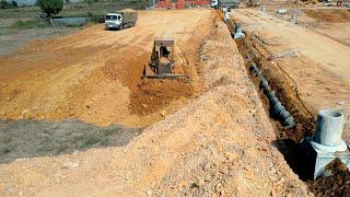 Full Process Connected Of Road Use Komatsu D58E Dozer Pushing Soil Stone And Dump Trucks Unloading